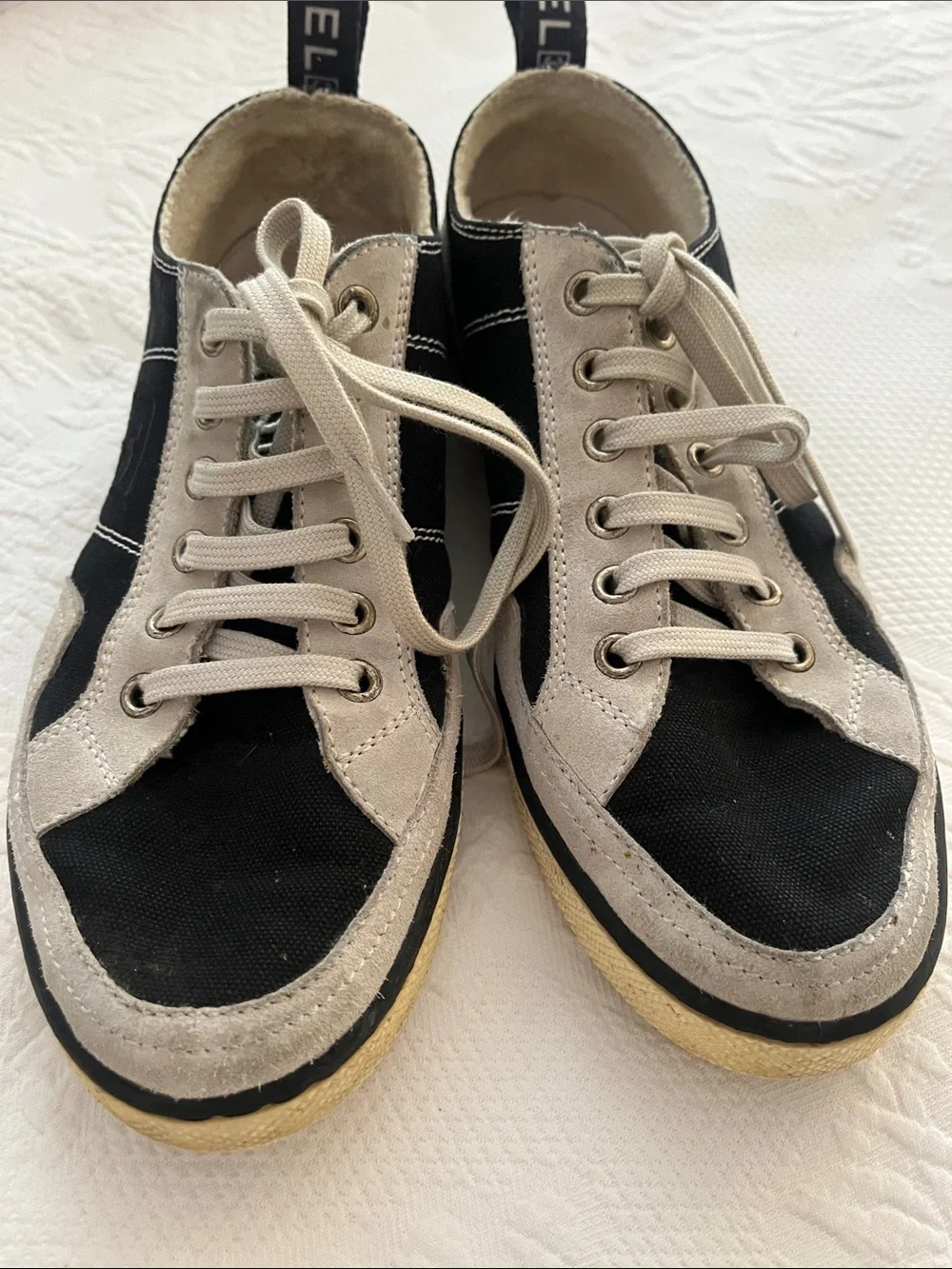 Chanel Women’s Black and Cream Lace-Up Sneakers